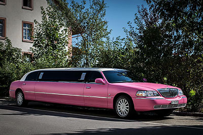 Pink stretch limousine Zurich